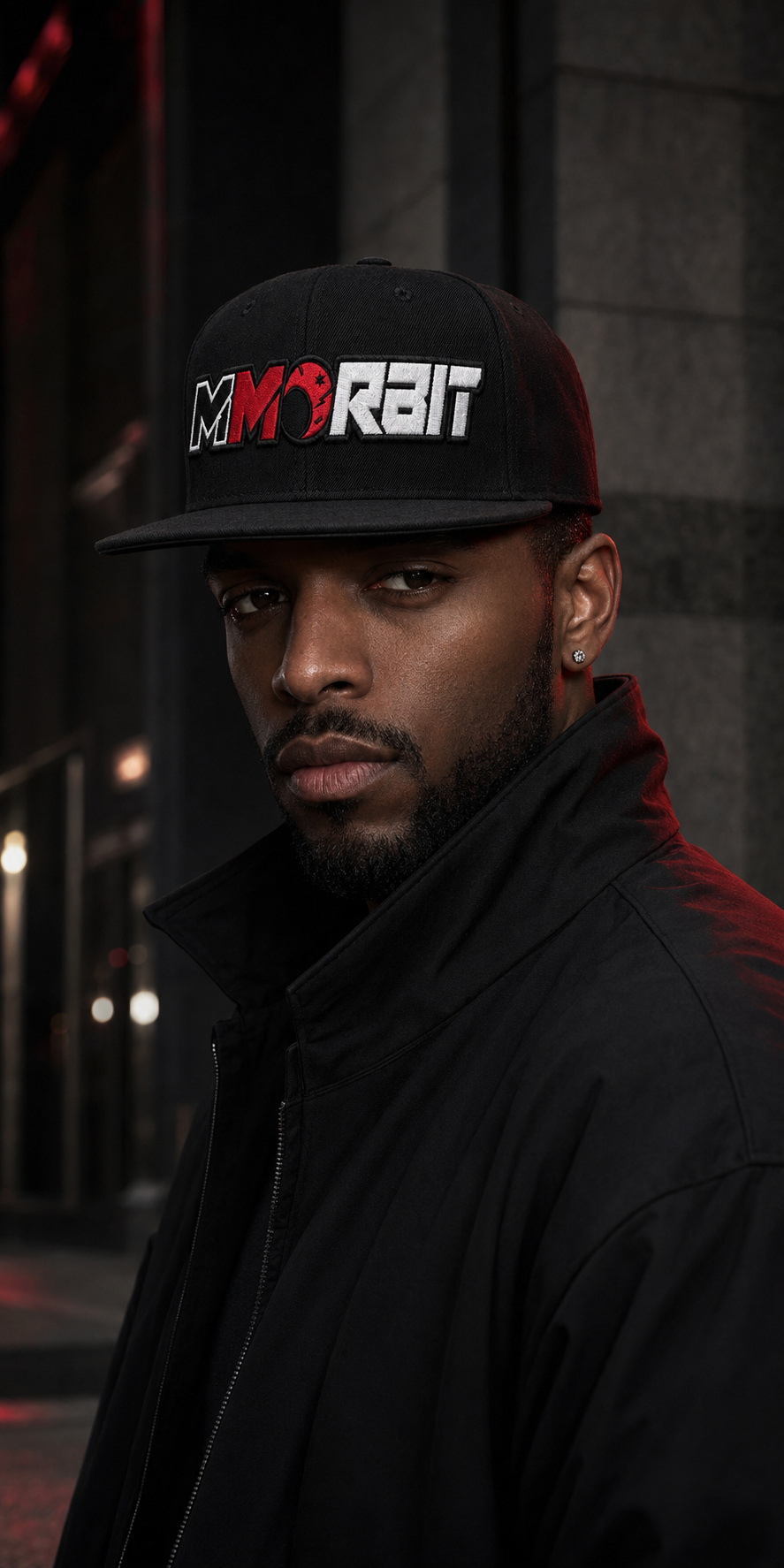 Model wearing the black MMORBIT RN-001 snapback