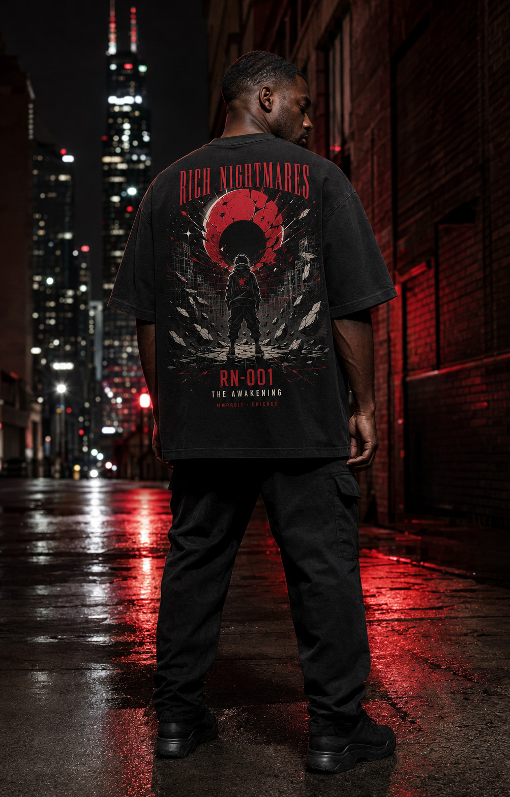 Model wearing the black MMORBIT Awakening T-shirt